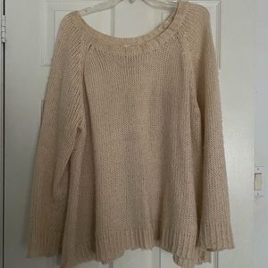 Blush pink sweater with bow details on back